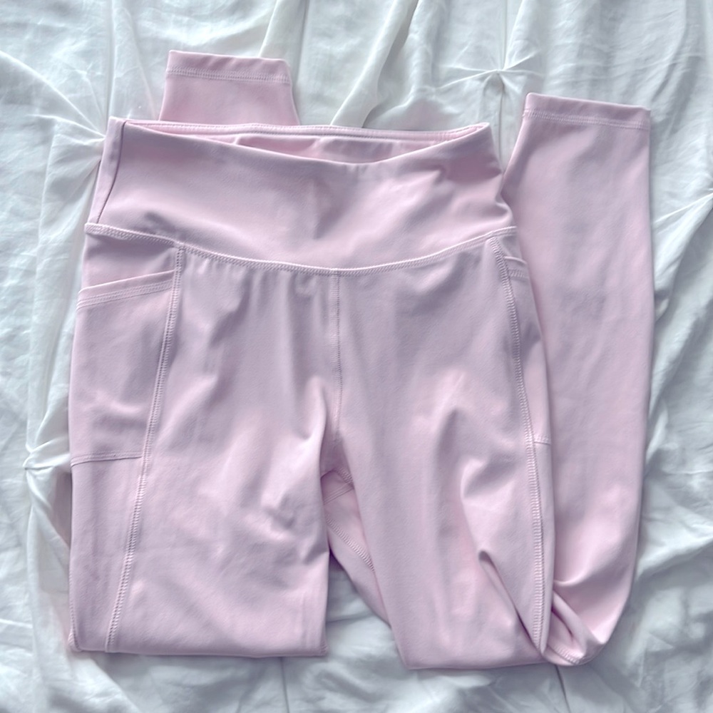 Pink workout leggings with side pockets